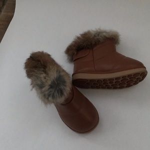 Little girls fur lined boots.